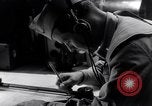 Image of navigator plotting a course Pacific Ocean, 1942, second 42 stock footage video 65675035344