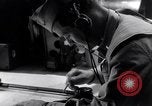 Image of navigator plotting a course Pacific Ocean, 1942, second 43 stock footage video 65675035344