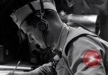Image of navigator plotting a course Pacific Ocean, 1942, second 44 stock footage video 65675035344