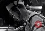 Image of navigator plotting a course Pacific Ocean, 1942, second 47 stock footage video 65675035344