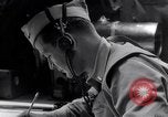 Image of navigator plotting a course Pacific Ocean, 1942, second 48 stock footage video 65675035344