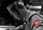 Image of navigator plotting a course Pacific Ocean, 1942, second 50 stock footage video 65675035344