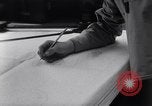Image of navigator plotting a course Pacific Ocean, 1942, second 51 stock footage video 65675035344