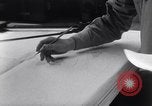 Image of navigator plotting a course Pacific Ocean, 1942, second 52 stock footage video 65675035344