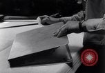 Image of navigator plotting a course Pacific Ocean, 1942, second 55 stock footage video 65675035344