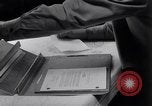 Image of navigator plotting a course Pacific Ocean, 1942, second 56 stock footage video 65675035344