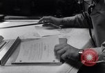 Image of navigator plotting a course Pacific Ocean, 1942, second 59 stock footage video 65675035344