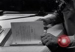 Image of navigator plotting a course Pacific Ocean, 1942, second 60 stock footage video 65675035344