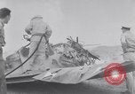 Image of Navy firefighters working at crash sites Pacific Theater, 1942, second 4 stock footage video 65675035347