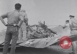Image of Navy firefighters working at crash sites Pacific Theater, 1942, second 6 stock footage video 65675035347