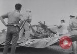 Image of Navy firefighters working at crash sites Pacific Theater, 1942, second 7 stock footage video 65675035347