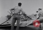 Image of Navy firefighters working at crash sites Pacific Theater, 1942, second 9 stock footage video 65675035347