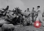 Image of Navy firefighters working at crash sites Pacific Theater, 1942, second 11 stock footage video 65675035347