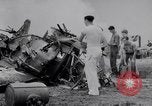 Image of Navy firefighters working at crash sites Pacific Theater, 1942, second 12 stock footage video 65675035347