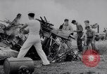 Image of Navy firefighters working at crash sites Pacific Theater, 1942, second 13 stock footage video 65675035347