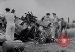 Image of Navy firefighters working at crash sites Pacific Theater, 1942, second 14 stock footage video 65675035347