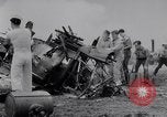Image of Navy firefighters working at crash sites Pacific Theater, 1942, second 15 stock footage video 65675035347