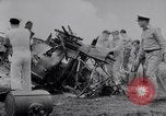 Image of Navy firefighters working at crash sites Pacific Theater, 1942, second 16 stock footage video 65675035347