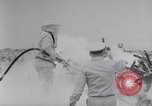 Image of Navy firefighters working at crash sites Pacific Theater, 1942, second 31 stock footage video 65675035347