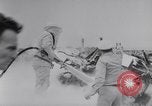 Image of Navy firefighters working at crash sites Pacific Theater, 1942, second 32 stock footage video 65675035347