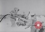 Image of Navy firefighters working at crash sites Pacific Theater, 1942, second 33 stock footage video 65675035347