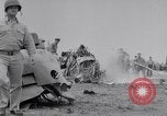 Image of Navy firefighters working at crash sites Pacific Theater, 1942, second 42 stock footage video 65675035347