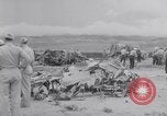 Image of Navy firefighters working at crash sites Pacific Theater, 1942, second 53 stock footage video 65675035347