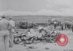 Image of Navy firefighters working at crash sites Pacific Theater, 1942, second 54 stock footage video 65675035347