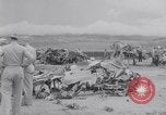 Image of Navy firefighters working at crash sites Pacific Theater, 1942, second 57 stock footage video 65675035347