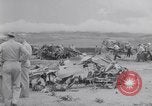 Image of Navy firefighters working at crash sites Pacific Theater, 1942, second 58 stock footage video 65675035347
