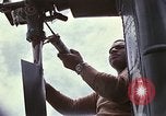 Image of UH 2A helicopter North Vietnam, 1967, second 33 stock footage video 65675035355