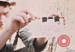 Image of US troops digging foxholes during Operation Big Spring  Vietnam, 1967, second 1 stock footage video 65675035381