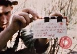 Image of US troops digging foxholes during Operation Big Spring  Vietnam, 1967, second 3 stock footage video 65675035381