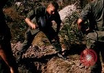 Image of US troops digging foxholes during Operation Big Spring  Vietnam, 1967, second 10 stock footage video 65675035381