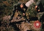 Image of US troops digging foxholes during Operation Big Spring  Vietnam, 1967, second 13 stock footage video 65675035381