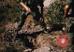 Image of US troops digging foxholes during Operation Big Spring  Vietnam, 1967, second 15 stock footage video 65675035381