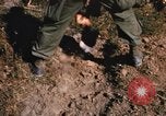 Image of US troops digging foxholes during Operation Big Spring  Vietnam, 1967, second 26 stock footage video 65675035381