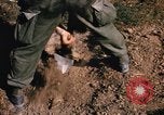 Image of US troops digging foxholes during Operation Big Spring  Vietnam, 1967, second 32 stock footage video 65675035381