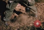 Image of US troops digging foxholes during Operation Big Spring  Vietnam, 1967, second 36 stock footage video 65675035381