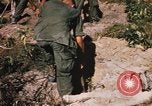 Image of US troops digging foxholes during Operation Big Spring  Vietnam, 1967, second 42 stock footage video 65675035381
