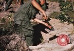 Image of US troops digging foxholes during Operation Big Spring  Vietnam, 1967, second 43 stock footage video 65675035381