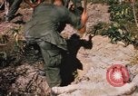 Image of US troops digging foxholes during Operation Big Spring  Vietnam, 1967, second 44 stock footage video 65675035381