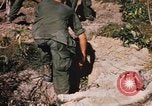 Image of US troops digging foxholes during Operation Big Spring  Vietnam, 1967, second 45 stock footage video 65675035381