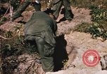 Image of US troops digging foxholes during Operation Big Spring  Vietnam, 1967, second 49 stock footage video 65675035381