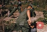 Image of US troops digging foxholes during Operation Big Spring  Vietnam, 1967, second 51 stock footage video 65675035381