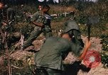 Image of US troops digging foxholes during Operation Big Spring  Vietnam, 1967, second 52 stock footage video 65675035381