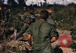 Image of US troops digging foxholes during Operation Big Spring  Vietnam, 1967, second 55 stock footage video 65675035381