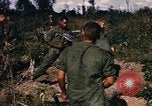 Image of US troops digging foxholes during Operation Big Spring  Vietnam, 1967, second 56 stock footage video 65675035381