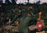 Image of US troops digging foxholes during Operation Big Spring  Vietnam, 1967, second 58 stock footage video 65675035381