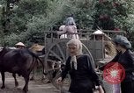 Immagine di Gli abitanti di un villaggio vietnamita Binh Duong provincia Sud Vietnam, 1967, secondo 62 filmato di repertorio 65675035393